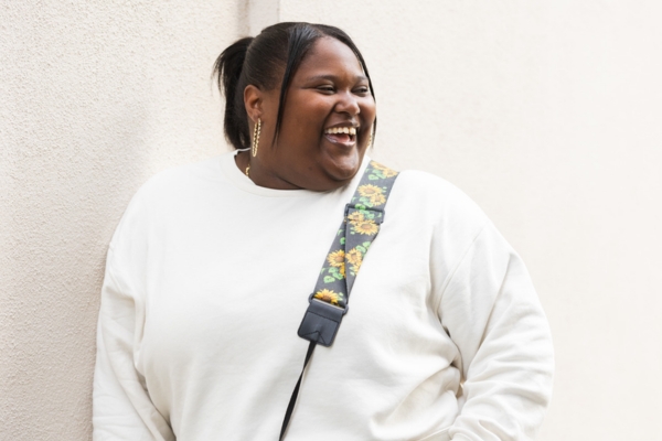 Woman smiling confidently — the positive outcome of psychiatric care at Minnesota Mental Health Clinics